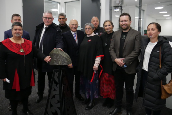 The Minister of Corrections Hon Kelvin Davis (3rd left) with the pounamu at the site's entrance. Pictured with National Commissioner Ben Clark (2nd left), DCE Māori Topia Rameka (2nd right) and Ngāi Tūāhuriri guests. 