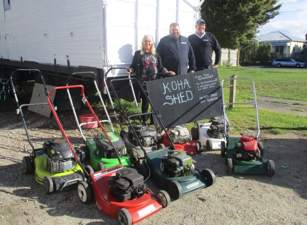 Sherron Sunnex from Koha Shed with Corrections Instructors Hayden Veart and Brent Scott with the mowers