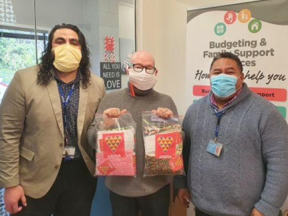 Northern Regional Support Advisers Pacific, Albert Tupuola (left) and ‘Alapapa’ Matthew Timaloa (right), with Mangere Budgeting and Family Support Services Chief Executive Darryl Evans, who will distribute the face coverings to families.
