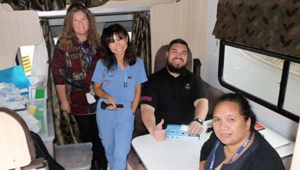 Inside the mobile clinic. (L-R): Papakura Community Corrections Service Manager Lyndsay Stanaway, GP Dr Juliette, Healthcare Assistant Pierre, and Manurewa Lead Service Manager Atawhai Kapa.