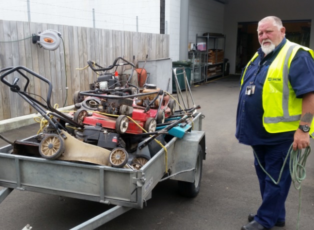 Community Work Supervisor Robert Padget with lawnmowers on their way to Whanganui Prison