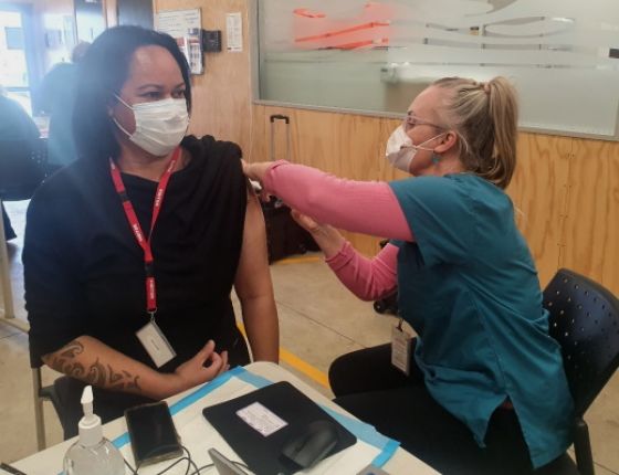 Huia Gibbs, Driver Licencing Instructor for Howard League Taranaki, receives her vaccination at Hāwera Community Corrections. 