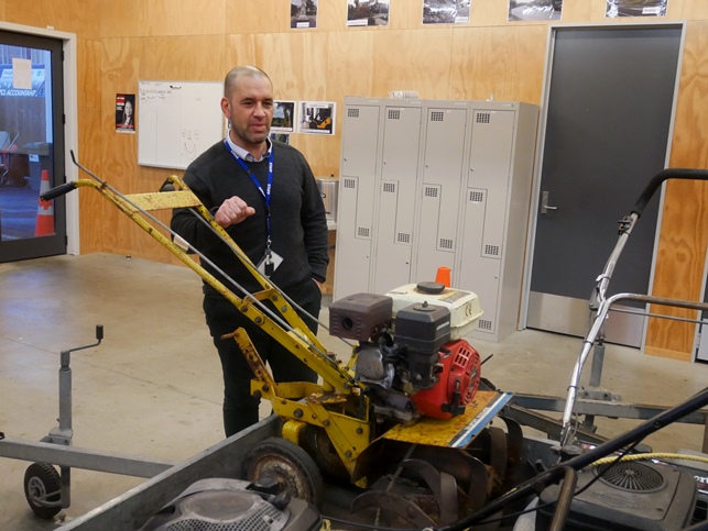 Service Manager Dean Wilson with the rotary hoe refurbished in Whanganui Prison