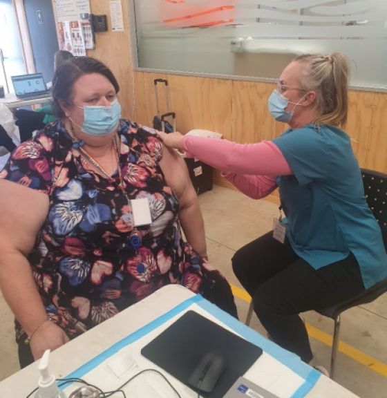 Hawera Service Manager Deb Rewi receives her vaccination at Hāwera Community Corrections.