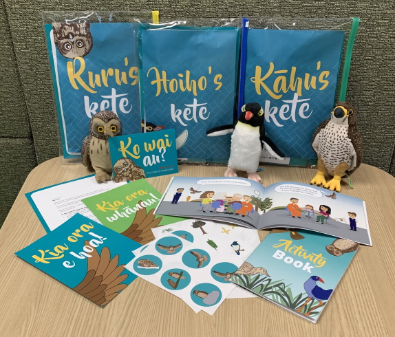 The kete contains a story book, soft toy, a pepeha card, stickers, letters and an activity book, which reflect the visual story on the walls so that it is familiar to tamariki when coming for their visit.