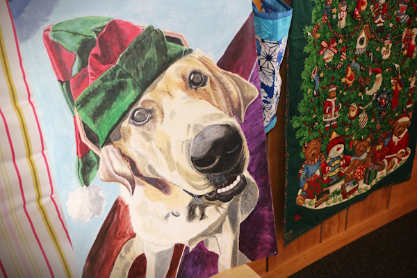 A painting of a golden retriever pup from the Mobility Dogs Charitable Trust training programme that is run at ARWCF. The artist is one of the dog trainers in prison.